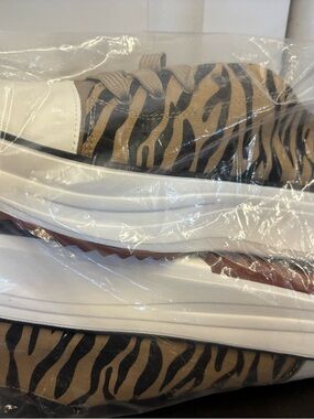 Some off brand tiger print shoes